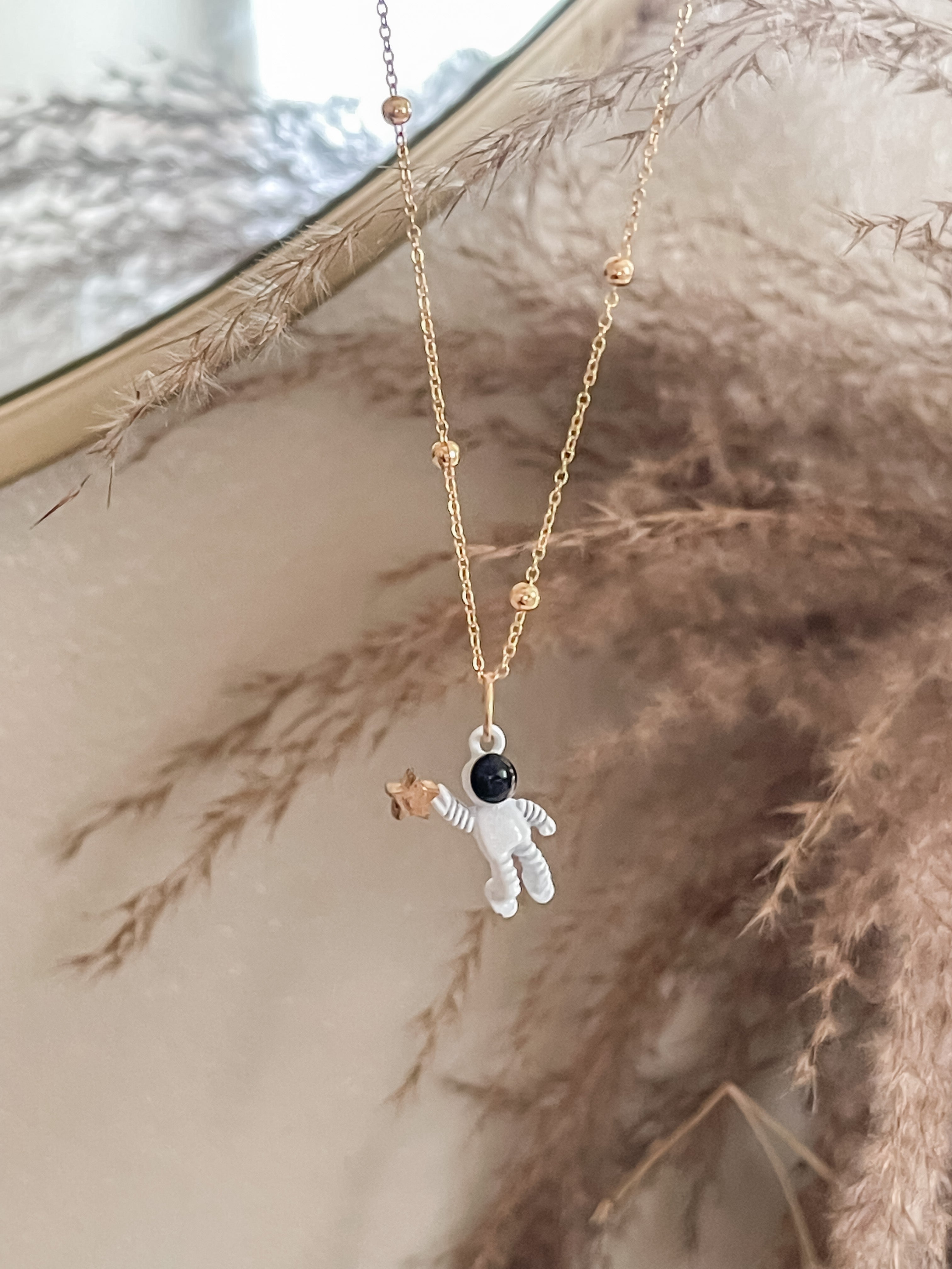 Astronaut necklace on sale